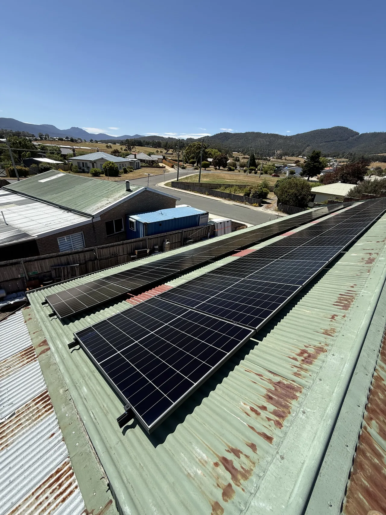 Two long rows of panels running the length of the roof