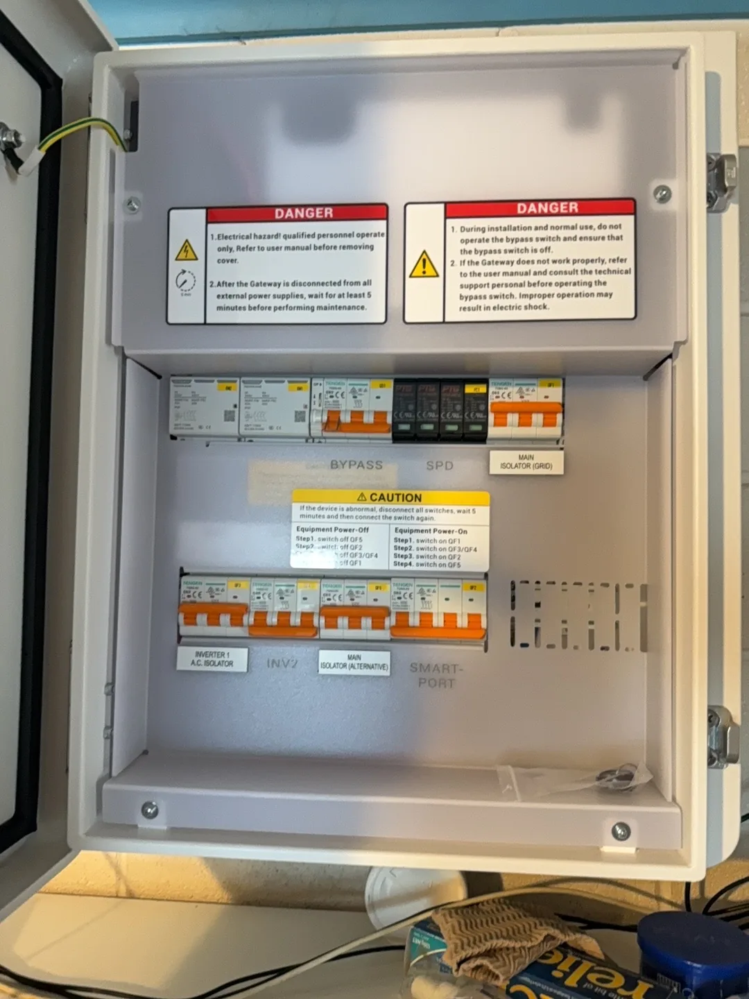 Energy gateway enclosure with danger labelling and bypass switching