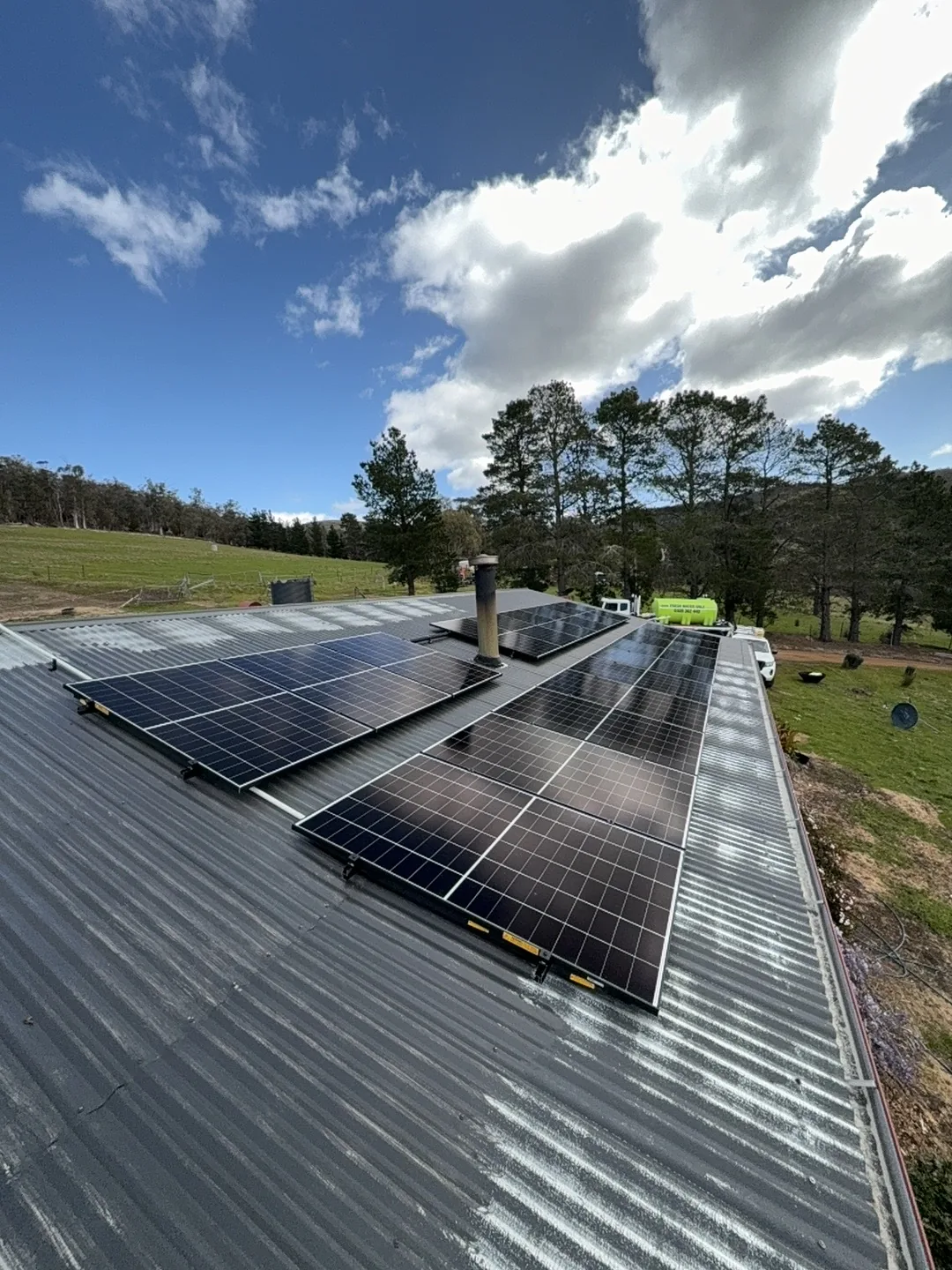 Two runs of panels meeting at the roof ridge