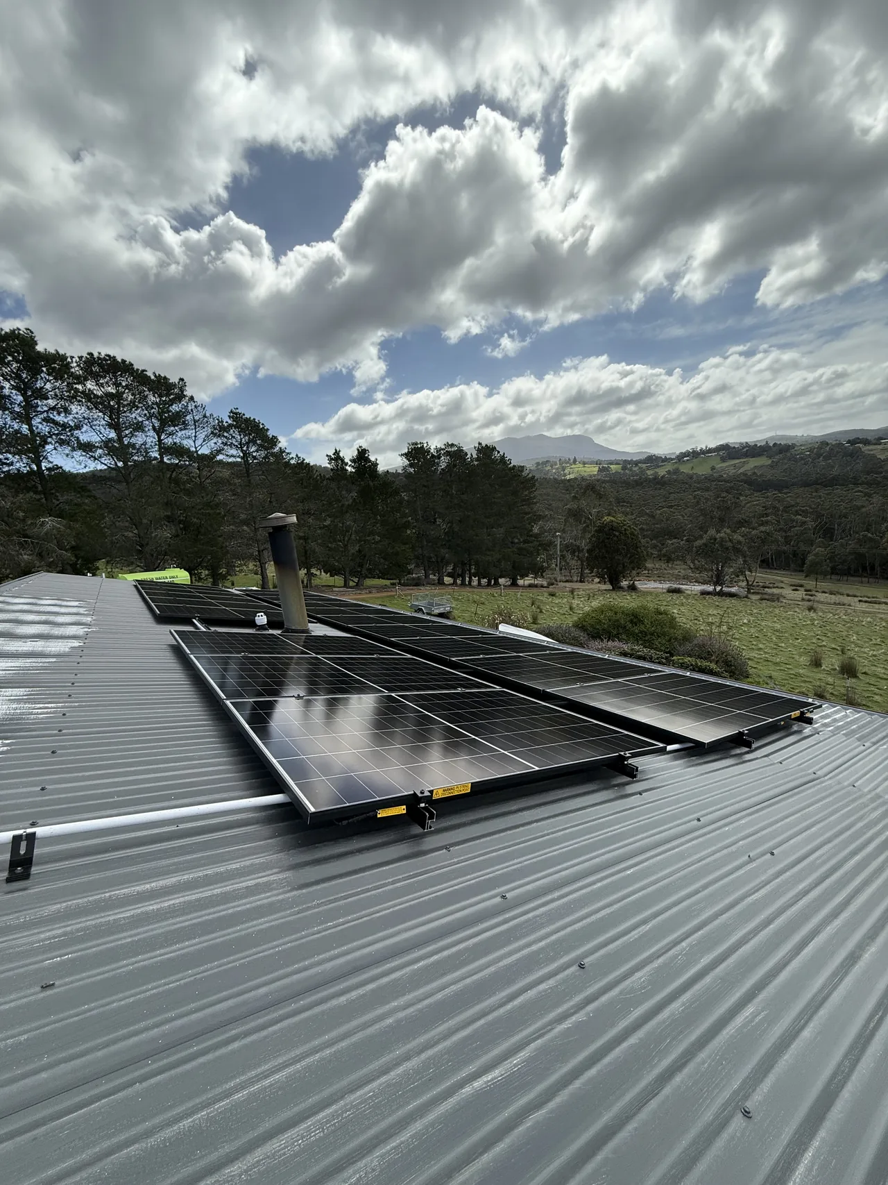 The array seen along the roof with open paddocks beyond