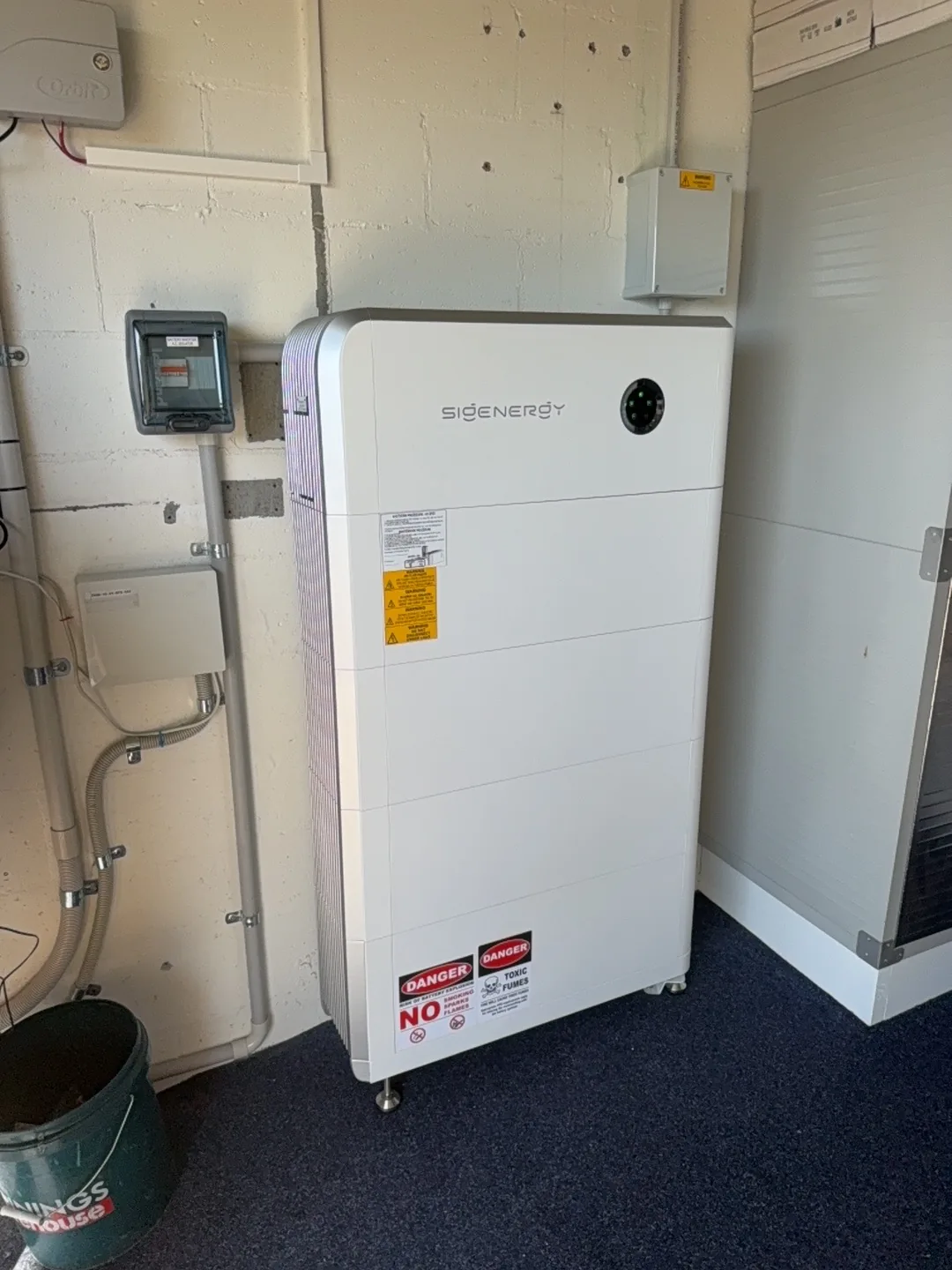 Sigenergy battery installed against an interior wall